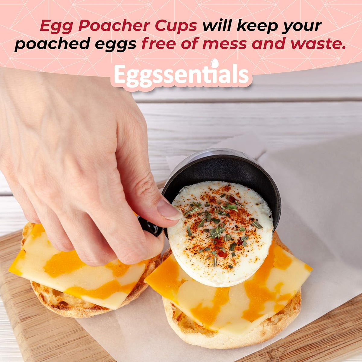 Hand using Egg Poacher Spare Removable Poaching Cup to place poached egg on cheesy breakfast muffin.