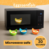 Colorful Silicone Egg Poaching Cups by Eggssentials cooking eggs in a microwave in just 30 seconds.