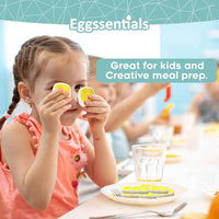 Child holding cubed boiled eggs over eyes, enjoying creative mealtime with Eggssentials egg cuber.